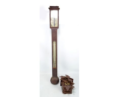 A J Newman of London stick barometer and a cuckoo clock (both af) (2).