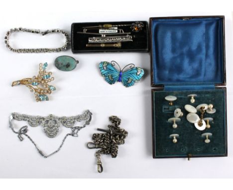 A small group of jewellery including a silver and guilloche enamel butterfly brooch hallmarked for Birmingham 1916, a part se