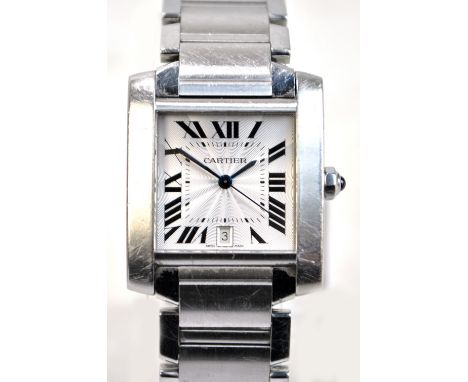 CARTIER; a lady's stainless steel Tank Française bracelet watch, the engine turned dial set with Roman numerals and date aper