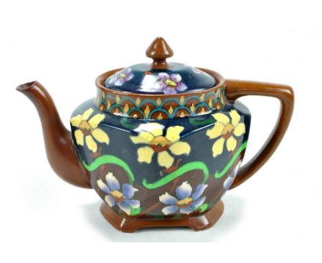 WILEMAN &amp; CO; a Foley 'Intarsio' teapot decorated with yellow and mauve narcissus flowers, printed marks to base Rd.No.33