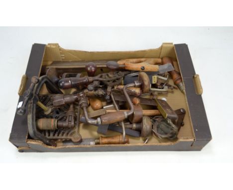 A group of various tools to include clamps, cranks, a set square, manual drills, etc.