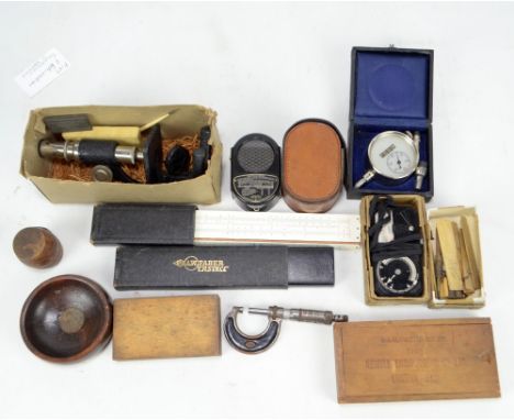 A small group of scientific and related instruments including a field microscope, a Newall Engineering Co of London external 