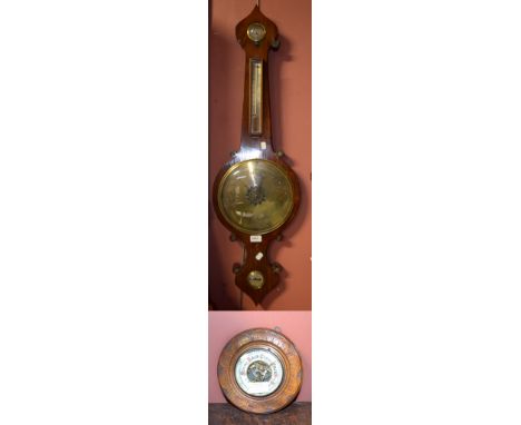A wheel barometer and thermometer stamped Realini Newcastle, length approx 104cm, and a small circular barometer.