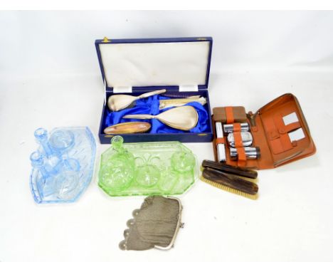 Two pressed glass Art Deco style dressing table sets with trays, also a gentleman's travel vanity set, a further dressing tab