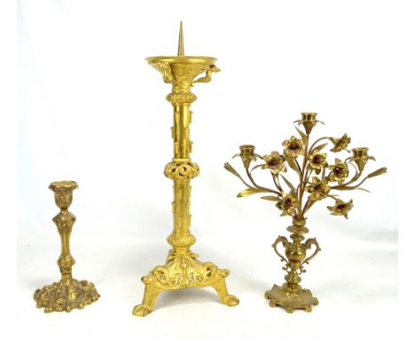 A 19th century gilt metal pricket candlestick with mythical beast and acanthus leaf decoration on cast tripartite base, heigh