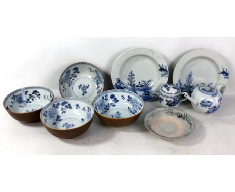 A group of Nanking Cargo wares including four large blue and white floral decorated bowls with brown exterior, teapot, two sh