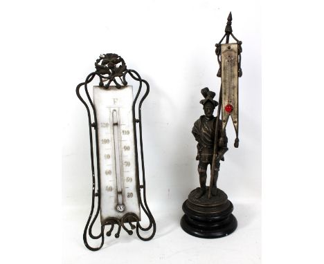 A late 19th century spelter thermometer modelled as a knight holding a standard with the thermometer modelled as the flag, he