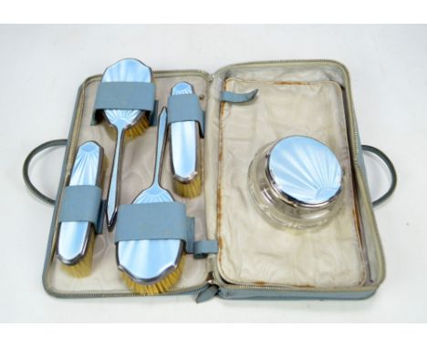 MAPPIN &amp; WEBB; a George V Silver Jubilee hallmarked silver and blue guilloche enamel backed six piece dressing table set 