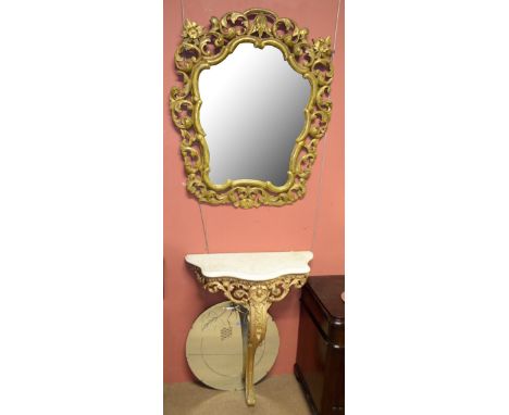 A 19th century giltwood console table with veined white marble serpentine top above pierced frieze and single scrolling uprig