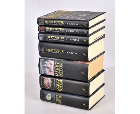 ROWLING, JK; a set of seven hardback Harry Potter books, the latter three First Editions, published by Bloomsbury, all with d
