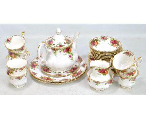 A Royal Albert 'Old Country Roses' pattern eight setting tea service comprising teapot, trios, milk jug, sugar bowl and two s