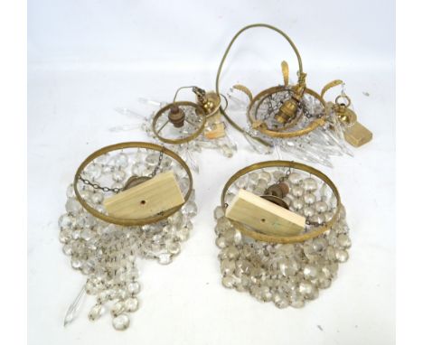 A pair of cut glass and brass light fittings and two further examples (4).