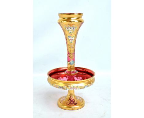 A Czechoslovakian cranberry glass heavy gilt floral decorated single horn epergne of tapering form above circular bowl and sp