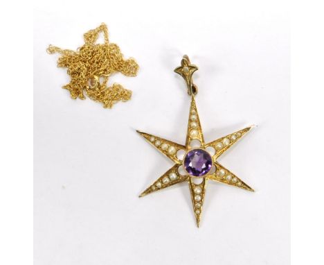 A late 19th/early 20th century 9ct yellow gold star pendant set with round cut amethyst and surrounding cultured seed pearls,