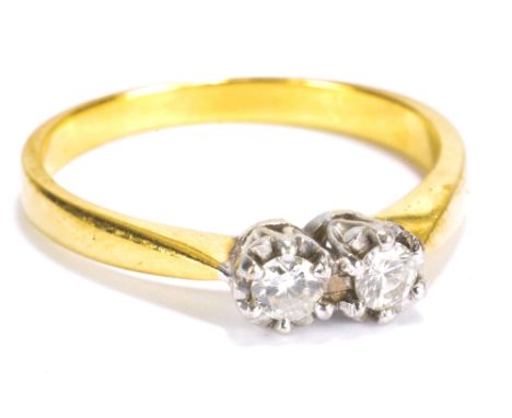 An 18ct yellow gold two stone diamond ring, 3.5g.