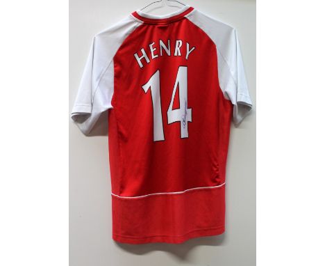 THIERRY HENRY; a signed Arsenal child's football shirt.