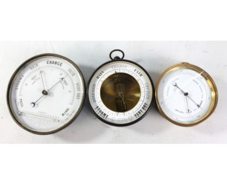 A circular metallic barometer, diameter 13cm, a holosteric barometer with white enamel dial inscribed 'Langford, Bristol', di