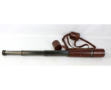 A three draw telescope in stitched leather case, inscribed 'Quick Focus 22/100 Spotter, JH Steward Ltd, London'. CONDITION RE