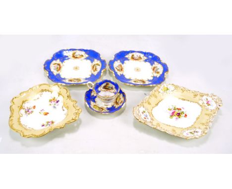 A pair of mid-19th century porcelain shaped square sandwich plates painted with architectural landscapes on gilt heightened b