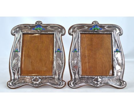 WILLIAM NEALE; a pair of large Edward VII hallmarked silver fronted Art Nouveau photo frames embossed with birds amongst styl