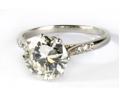 A good platinum and diamond solitaire ring, the principal brilliant cut stone weighing approx 2cts within an eight claw setti