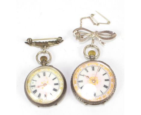 A silver crown wind fob watch with white enamel dial set with Roman numerals mounted on a later bow brooch attachment and a f