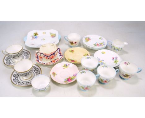 SHELLEY; a 'White Flowers' pattern part tea set comprising three trios, spare saucers and sandwich serving plates, also two p