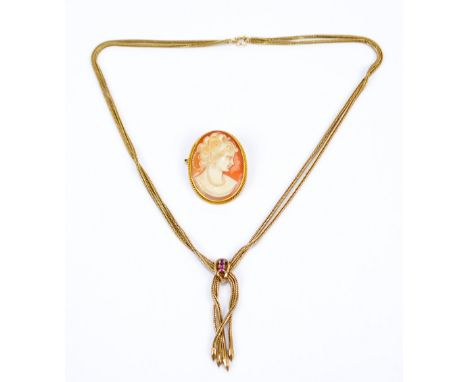 A 9ct yellow gold double strand wheat link necklace with ruby set knot and tassels, length 46.5cm, and a 9ct gold framed came