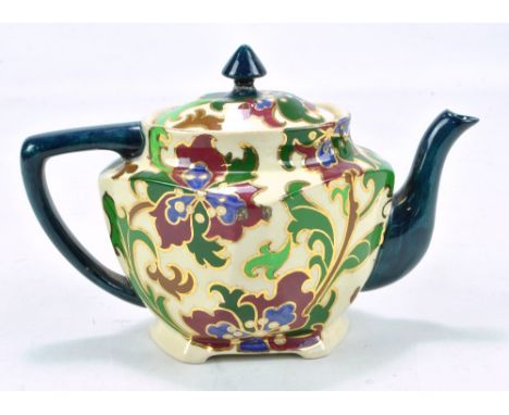 WILEMAN &amp; CO; a Foley 'Faience' teapot decorated with stylised floral sprays, printed marks Rd.337994. 3177, length 21cm.