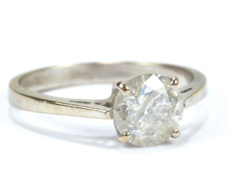 An 18ct white gold and diamond solitaire ring, with insurance valuation stating the round brilliant cut stone weighs 1.43cts,