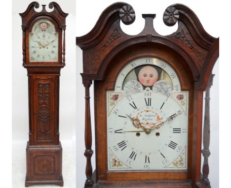 A 19th century oak and mahogany crossbanded eight day longcase clock, with broken swan neck pediment above arched painted dia