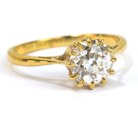 An 18ct yellow gold and diamond solitaire ring, the round cut stone weighing approx 1.28cts in high claw setting with pierced