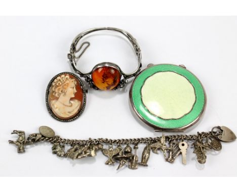 A French silver framed marcasite set oval cameo brooch, 4.5 x 3.5cm, a white metal Art Nouveau style Baltic amber set snap ba