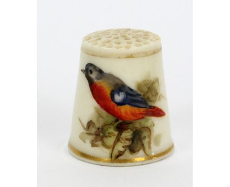 A Royal Worcester hand painted porcelain thimble decorated with a bird among foliage, in fitted case.