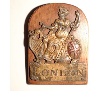 London Assurance Fire Mark,  1720-1965, W9G, lead, G, some wear to high relief areas, polished, mounted on wooden panel