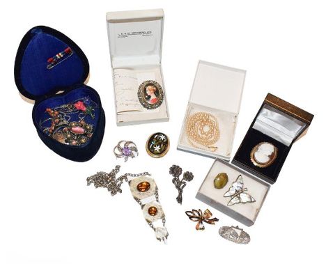 An amethyst brooch, stamped 'Iona', measures 3.3cm diameter; a cameo brooch/pendant, stamped '9CT'; a miniature brooch/pendan