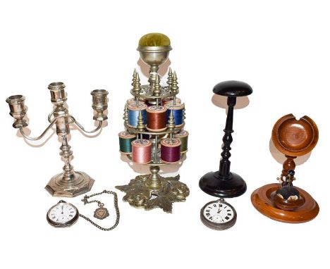 Metal two tier bobbin stand, plated candelabrum, ebonised wig stand, combined watch stand and pin cushion labelled to base 'H