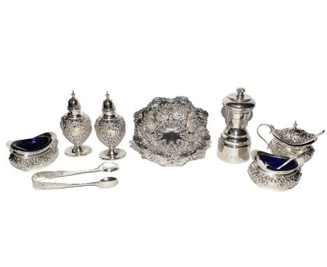 A collection of assorted silver, including: a five-piece condiment-set, each piece stamped with foliage; a pair of fluted and