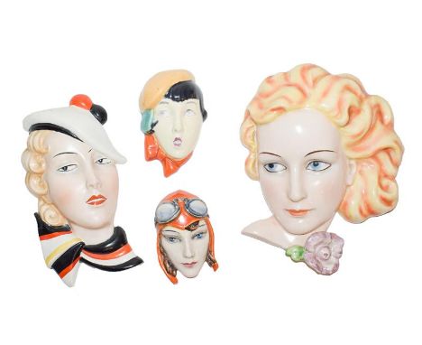 Goebels deco wall mask of a blonde girl, a Czech smaller mask of girl with striped scarf, a smaller model of girl with yellow