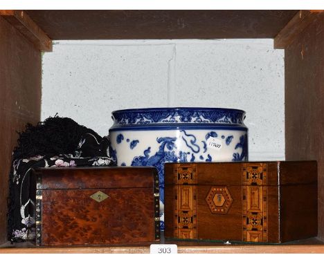 A circa 1920's embroidered shawl; a Royal Doulton blue and white transfer painted jardiniere; together with a burr walnut tea