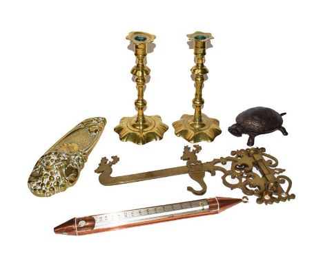 A pair of 18th century brass candlesticks on petal bases, a copper jam thermometer, brass desk stand etc. (one tray)