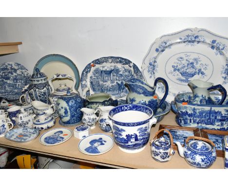 A QUANTITY OF BLUE AND WHITE CERAMICS, to include meat plates, tureens, sauce boats, plates, jugs, a willow pattern kettle, a