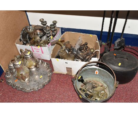 TWO BOXES AND LOOSE METALWARE, to include three large cast iron cooking pots for over a fire, brass wall bell, fireplace tool