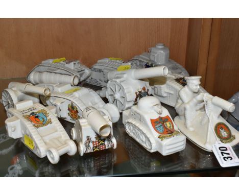 A GROUP OF TWELVE CRESTED WARE MILITARY TANKS AND CANNON ORNAMENTS FROM ASSORTED MANUFACTURERS to include seven tanks compris