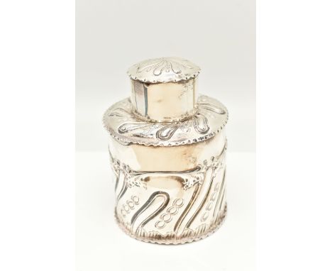 AN EARLY 20TH CENTURY SILVER TEA CADDY, embossed foliate pattern with slide on cover, hallmarked 'Sibray, Hall &amp; Co Ltd' 