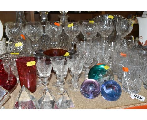 A LARGE COLLECTION OF GLASS ITEMS, to include three cut glass decanters one being Royal Brierley, glass art deco vase, an ass