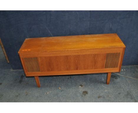 A 'STEREOSOUND PRODUCTIONS' RADIOGRAM in a teak veneered cabinet width 117cm depth 35cm height 59cm (PAT pass, turntable work