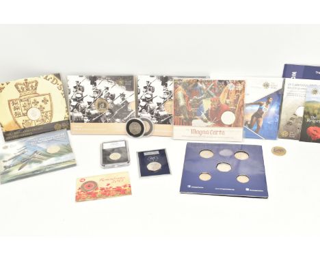 A CARDBOARD BOX CONTAINING ROYAL MINT CASED AND CARDED COINS, to include sealed packs golden Guinea 2015 £2, Magna Carta 2015