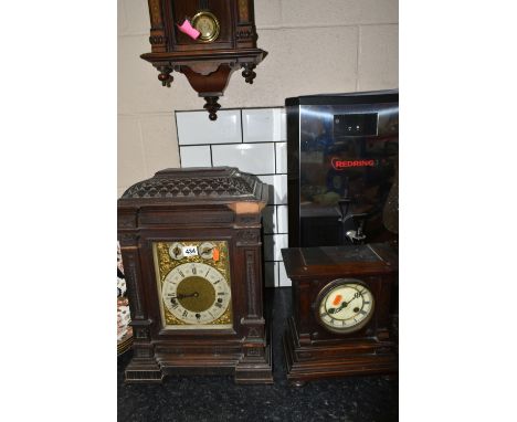 A GROUP OF THREE CLOCKS comprising a Camerer and Kuss Co clock height 29cm cm x width 25cm (bezel doesn't close completely, p