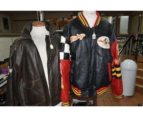TWO VINTAGE MICKEY MOUSE LEATHER JACKETS, comprising a black, red and yellow jacket made by Mickey Inc. Disney, approximate s
